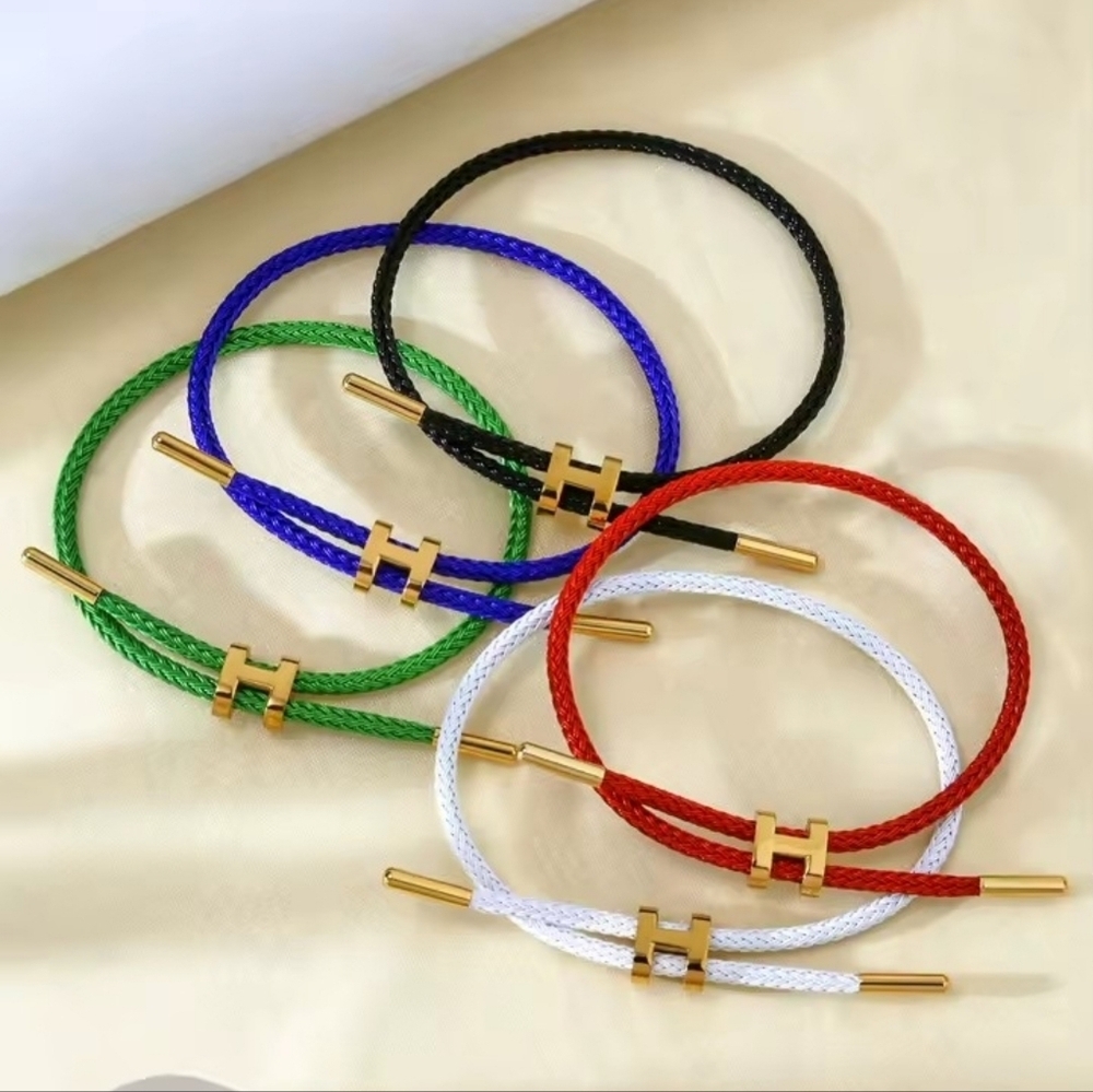 ✨ Blue Braided Cable Bracelet with Gold-Tone Accents ✨ - Picture 2 of 3